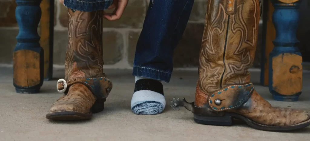 Wear Thick Socks with cow boy boots 